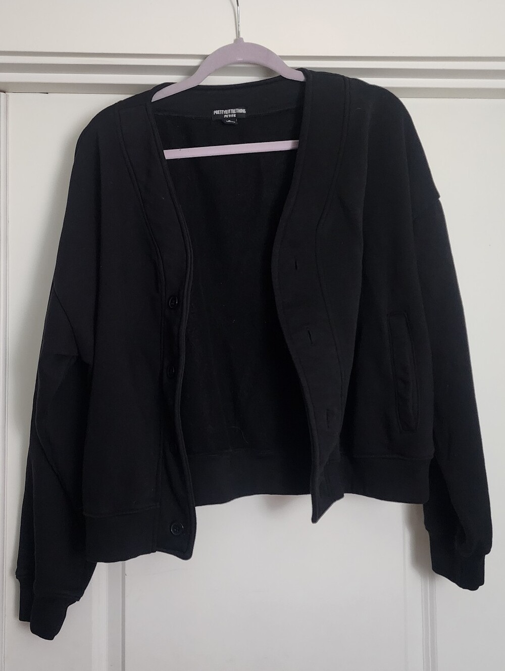 PrettyLittleThing Black Button-Front Oversized Cropped Athleasure Jacket